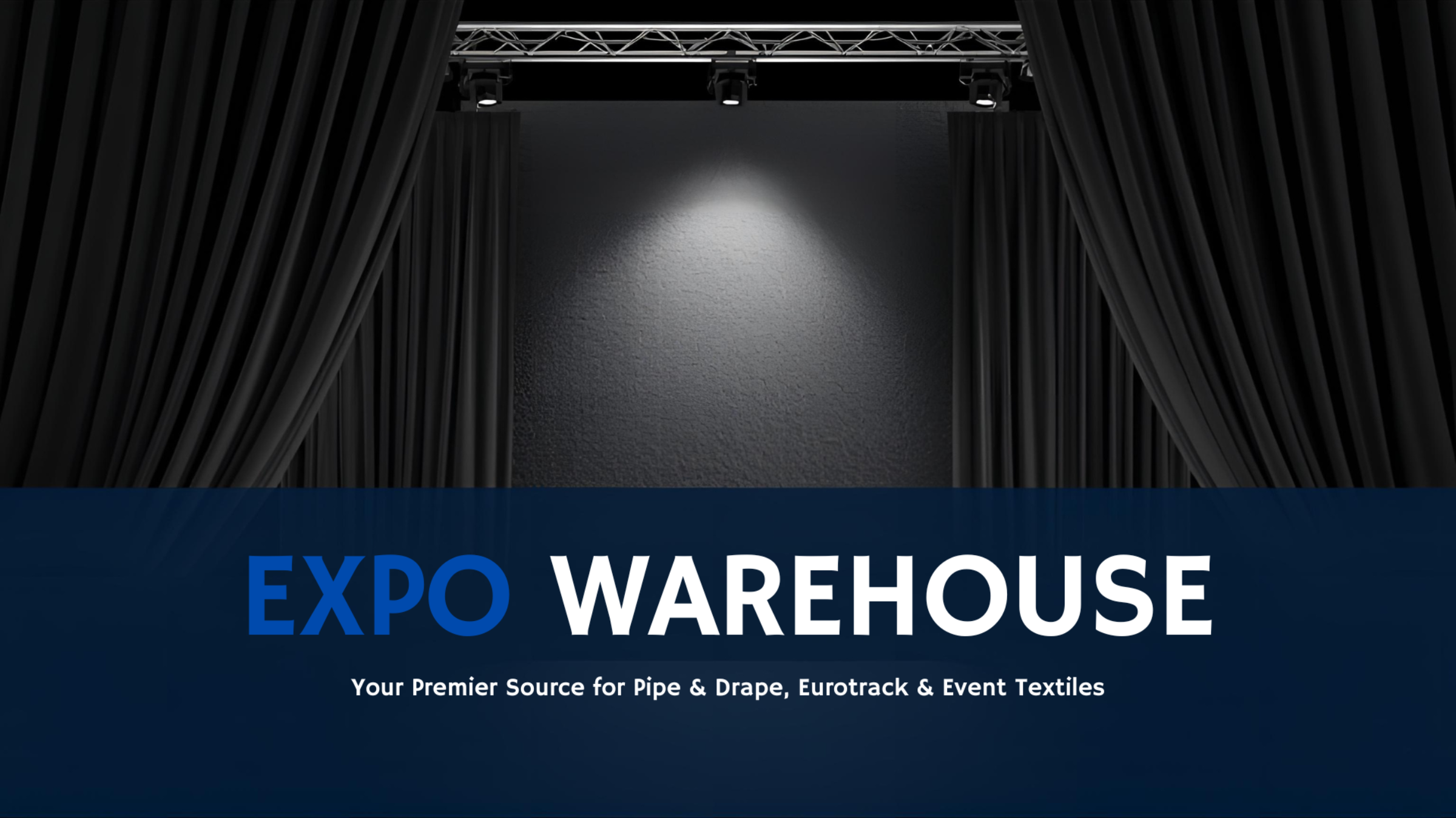 Pipe and drape stage backdrop with theatrical truss and spotlight
